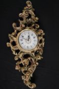 A reproduction Louis XV clock. H.82 W.35cm.