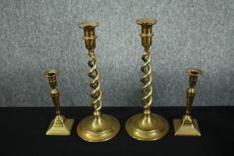 Two pairs of Victorian brass candleholders. H.32Cm. (largest)