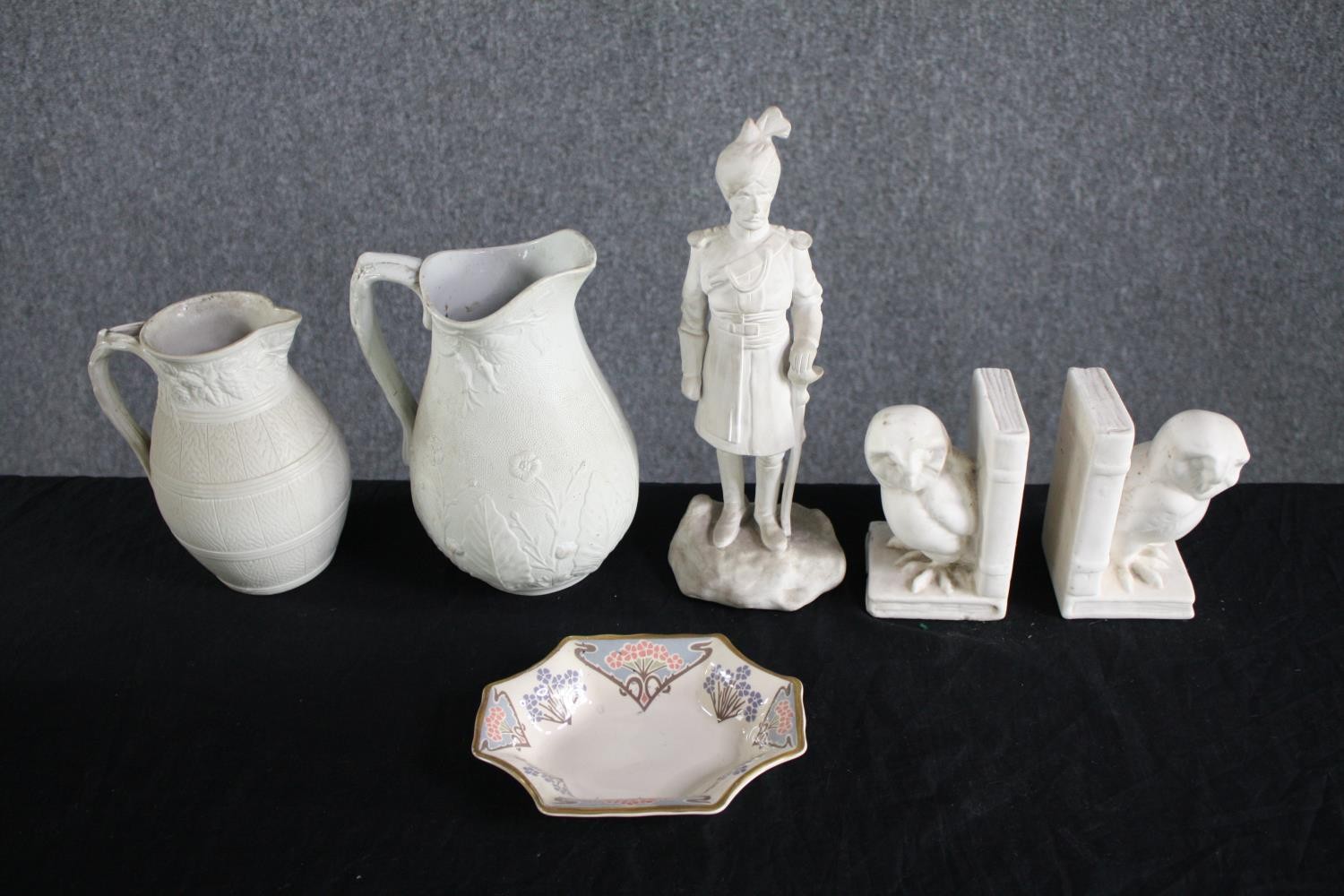 A small Liberty store dish, a pair of owl bookends, a Cobridge Alloa white jug and a sikh soldier