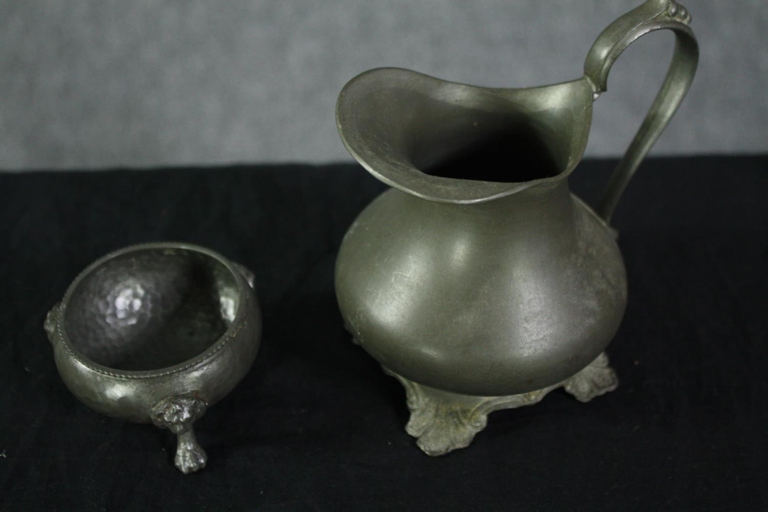 A mixed collection of pewterware. Including jugs, pots and a cup. H.20cm. (largest) - Image 4 of 5