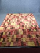 A contemporary William Yeoward woollen carpet of allover geometric design. L.308 W.233cm.