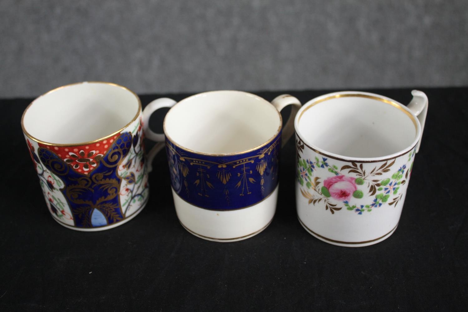 A mixed collection of 19th century hand decorated coffee cans. With gilt edging and mostly floral - Image 3 of 4