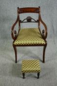 A Regency mahogany armchair along with a 19th century footstool covered in the same material.