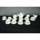 A Colclough ivy leaf tea set. Dated 1991. Incomplete. Includes a teapot, creamer, sugar bowl, side