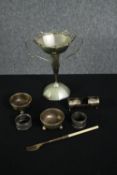 A mixed collection of silver plate including a pair of napkin rings, a fork, an Art Nouveau twin