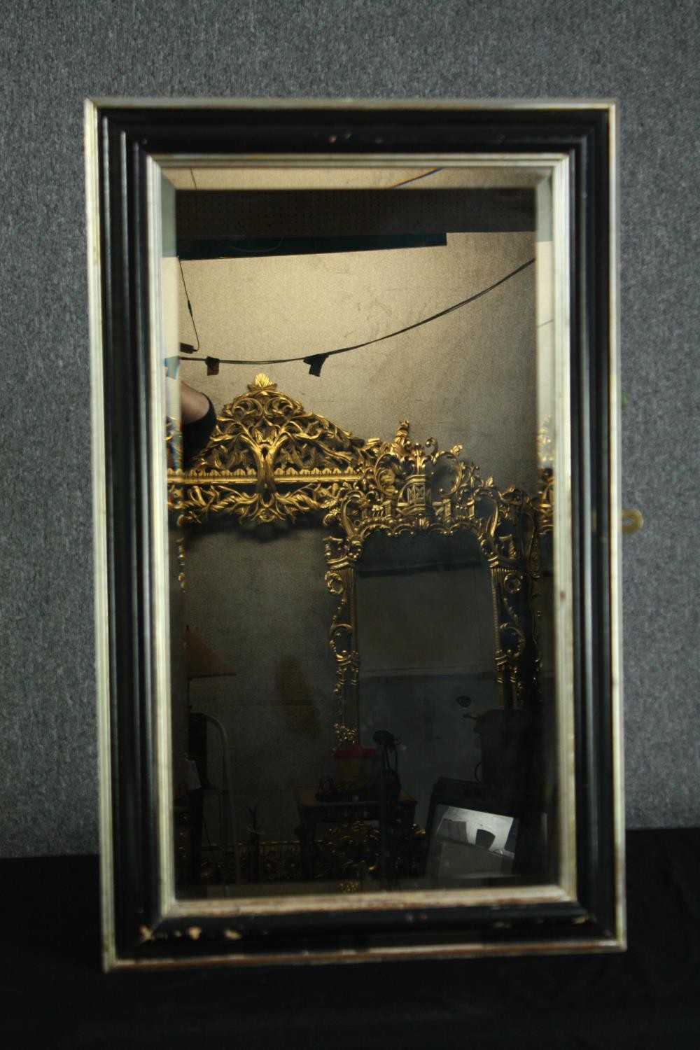 Wall mirror, moulded painted frame with bevelled plate. H.87 W.53cm.