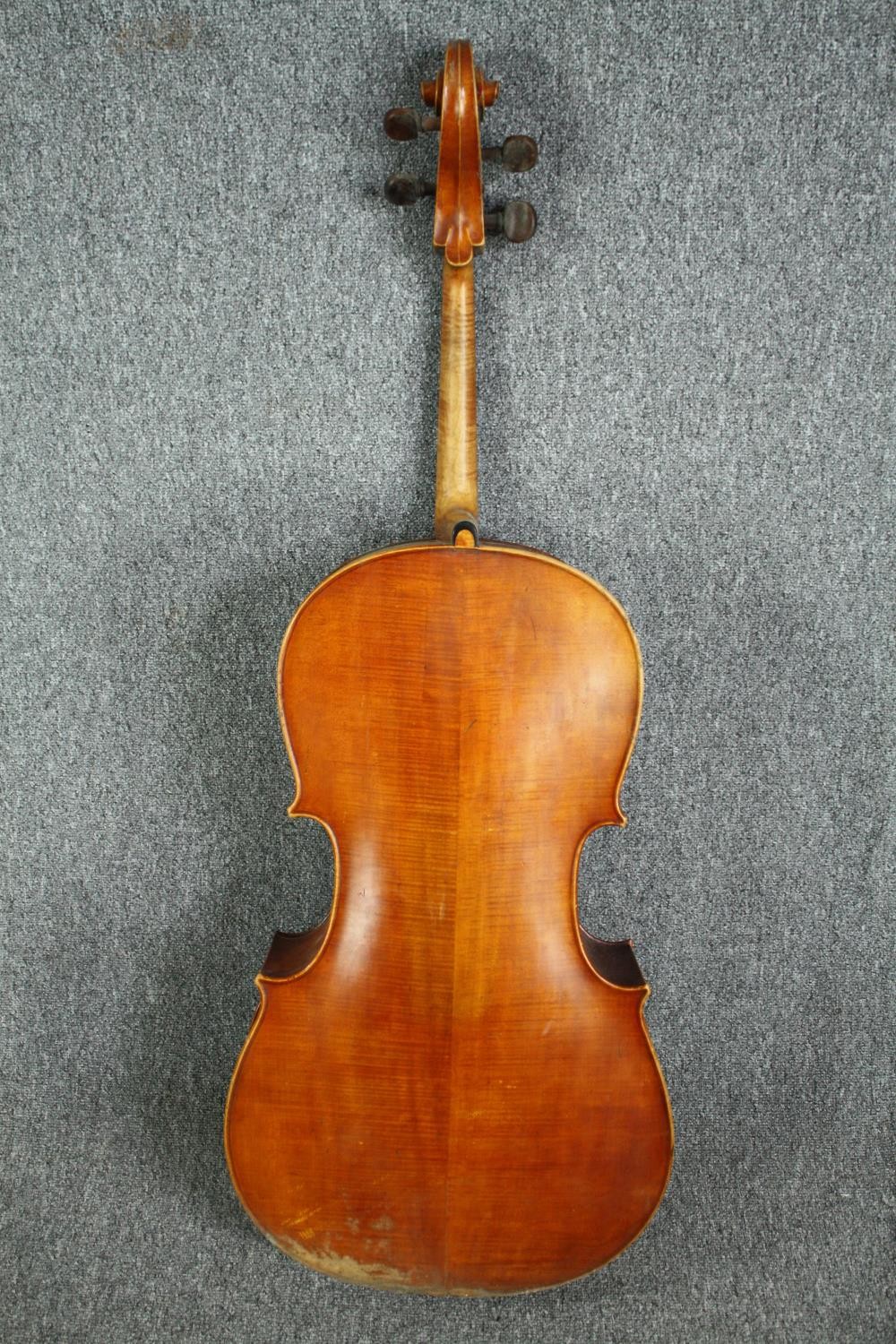 A cello in a soft case with no visible maker's mark. Road worn and with signs of being well - Image 5 of 6