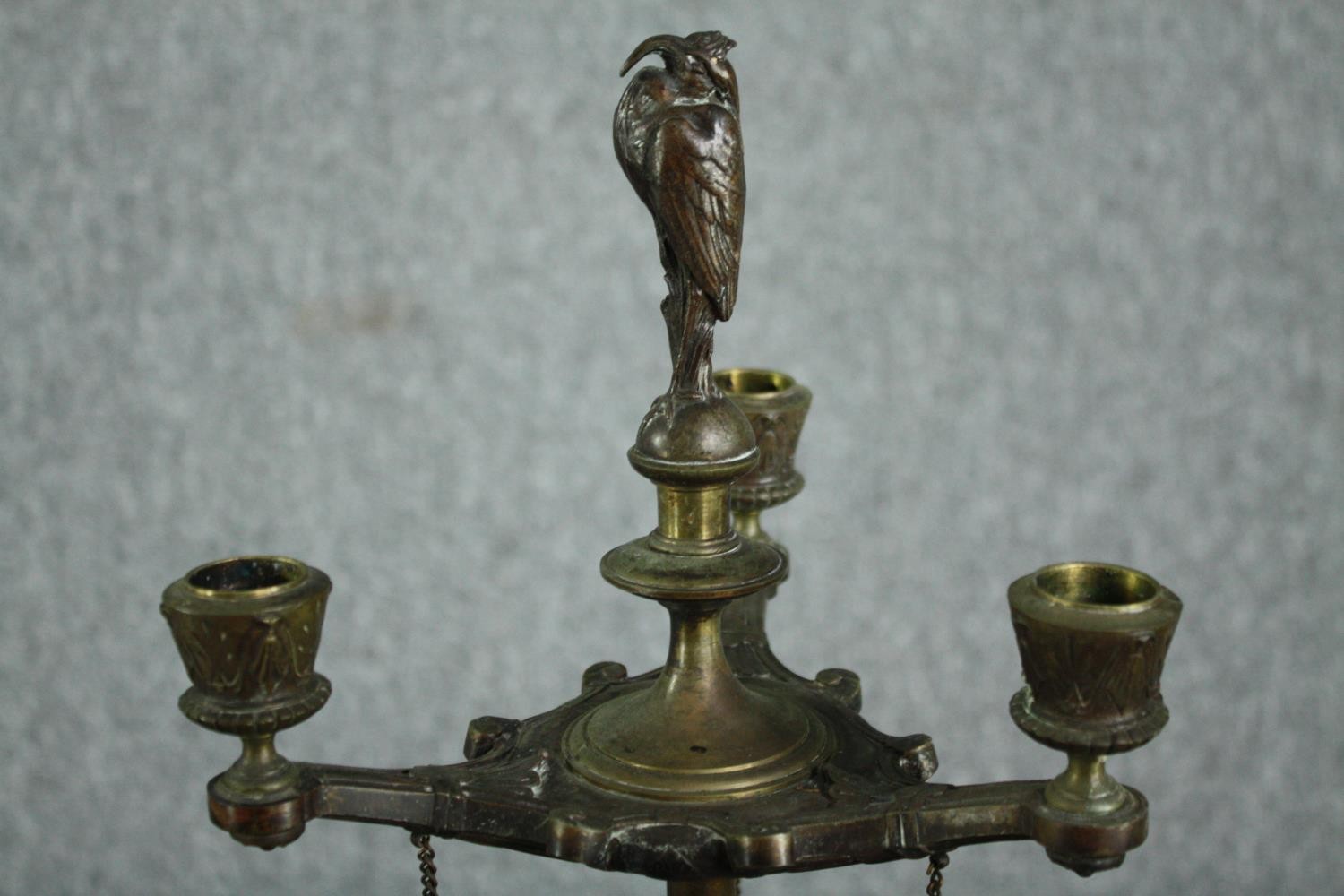 A nineteenth century brass candlestick. With three arms of candle holders bound by chains. With - Image 2 of 5