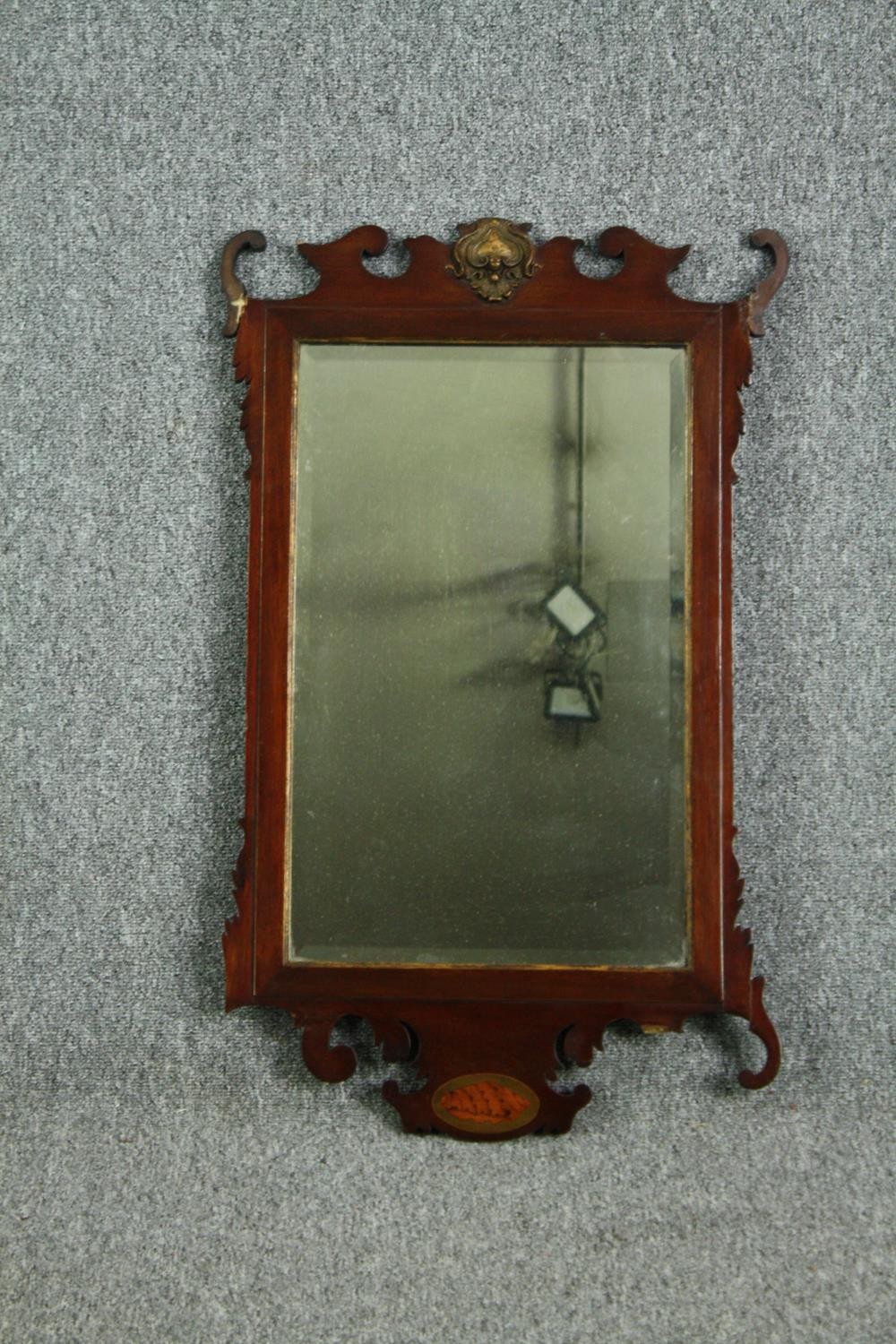 Wall mirror, 19th century fret carved mahogany with bevelled plate, gilt cresting and satinwood