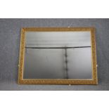 Wall mirror, contemporary gilt framed with bevelled plate. H.107 W.137cm.