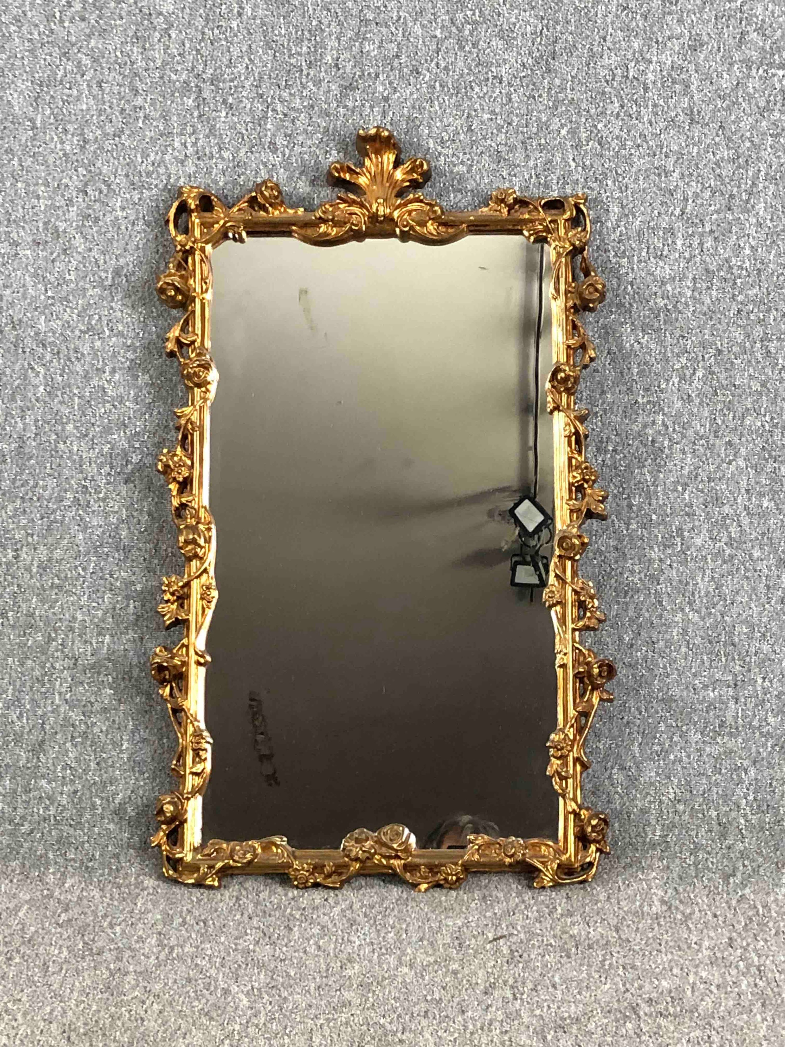 Pier mirror, early 20th century carved giltwood with foliate cresting and scrolling decoration. H.