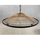 Kindred Lighting. The Mambo natural rattan ceiling pendant. Rattan with a metal surround and