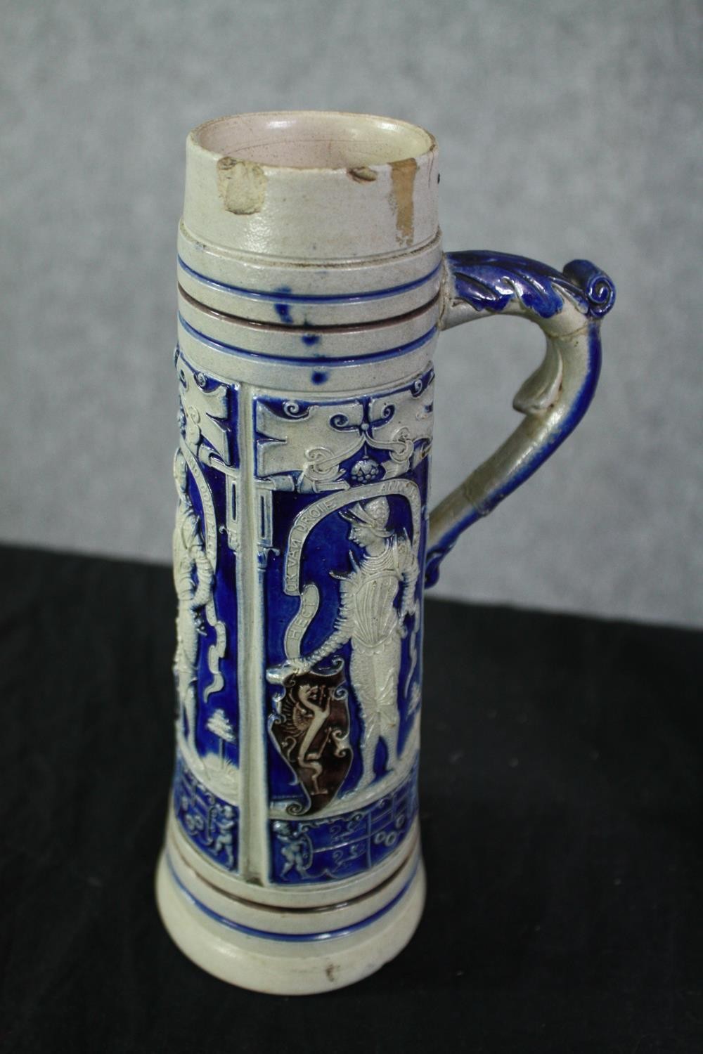 A Doulton Lambeth Stoneware reform flask. Lord Brougham. A Gerz salt glaze German tankard. - Image 5 of 6