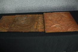 Four early twentieth century suspended ceiling leaf tiles. Three from pressed tin and one copper.