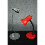 Two desk lamps. Chrome with the other in a red finish. H.41cm. (largest)