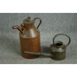 An nineteenth century copper milk churn with a metal watering can. The churn with some ageing and