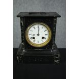 A 19th century slate and marble mantel clock with white enamel dial. Has it's key. H.20cm.