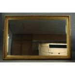 Wall mirror, large contemporary in gilt foliate frame with bevelled plate. H.135 W.200cm.