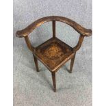 Corner chair, early 19th century oak with all over Classical style and scrolling foliate pen work