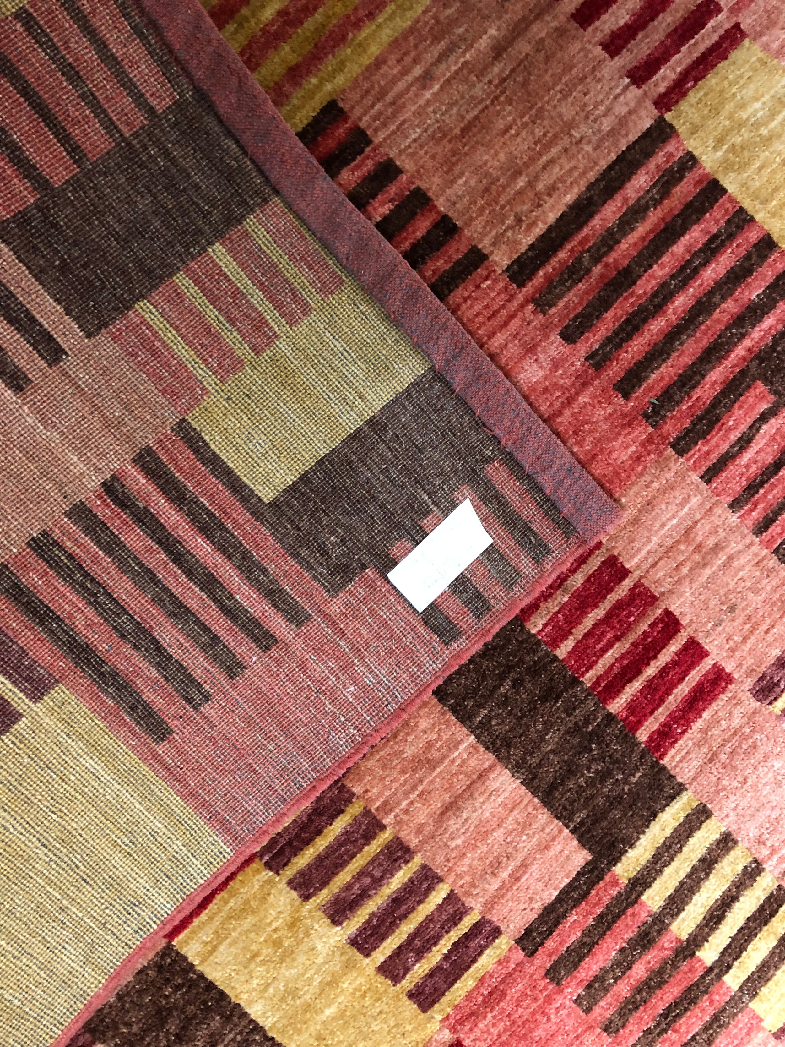 A contemporary William Yeoward woollen carpet of allover geometric design. L.308 W.233cm. - Image 3 of 3