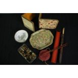 Miscellaneous. Bookends, military buttons, chop sticks, a seal and a bowl. L.26cm. (largest)