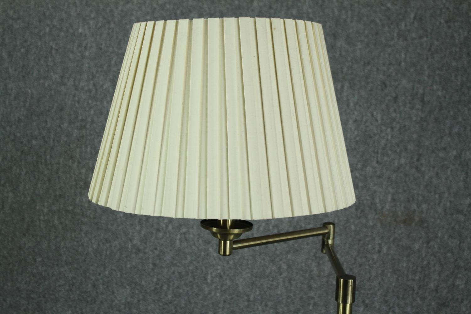 A modern standing floor lamp with articulated adjustable arm. Metal with a brass effect finish. H. - Image 2 of 3