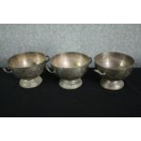 Three early twentieth century silver plated punch bowls. Each in a six pint volume. Stamped 'H'