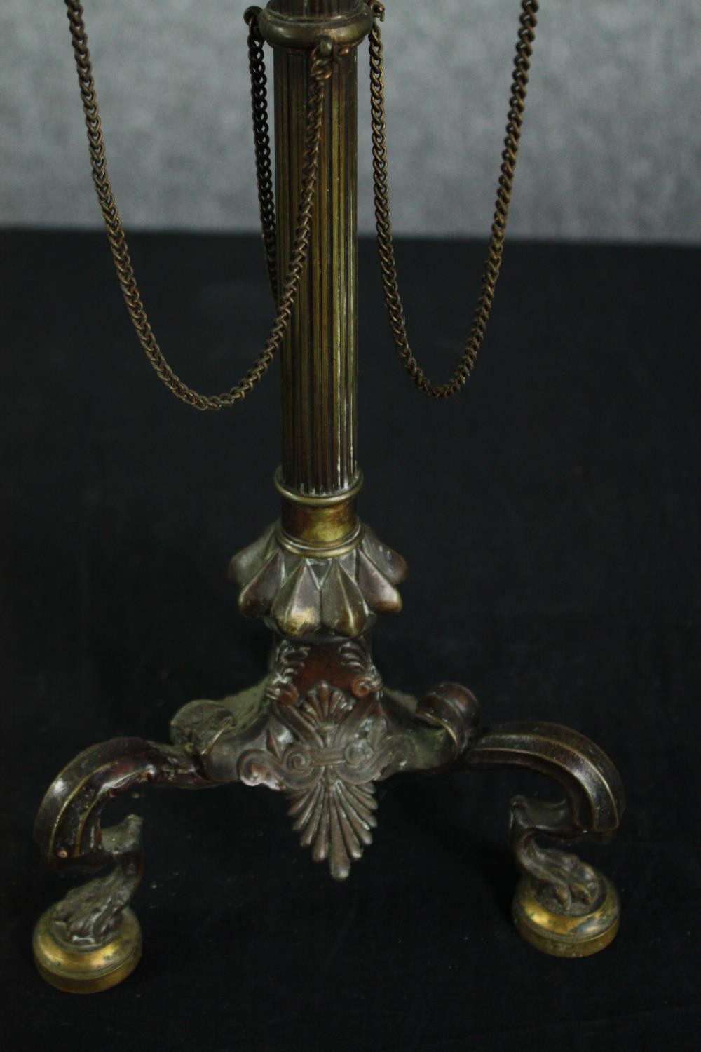 A nineteenth century brass candlestick. With three arms of candle holders bound by chains. With - Image 3 of 5