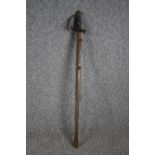 A sword and scabbard. Quite rusted and without a visible maker's mark. With a wooden handle and