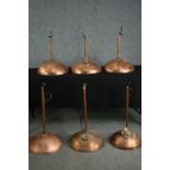 Upcycling. A set of six copper downlights salvaged from the tops of old storage boilers. H.50cm