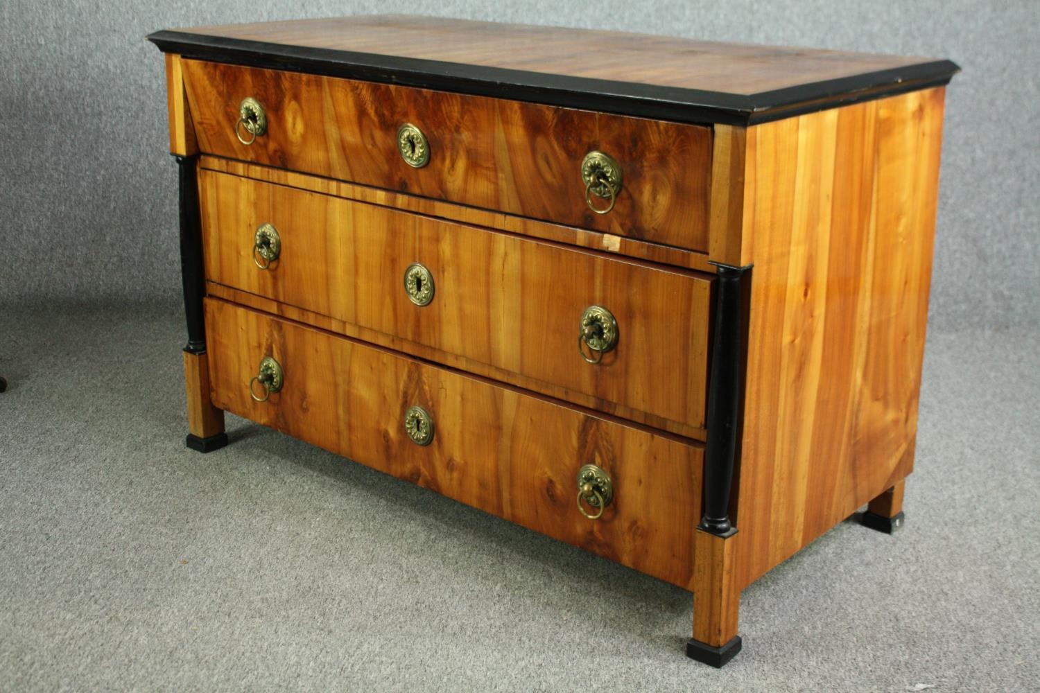 An early 19th century walnut Biedermeier chest of three long drawers flanked by ebonised pilasters - Image 3 of 8