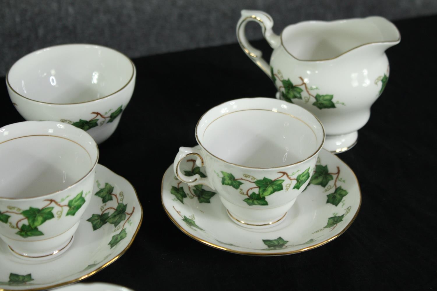 A Colclough ivy leaf tea set. Dated 1991. Incomplete. Includes a teapot, creamer, sugar bowl, side - Image 5 of 10