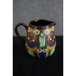 A Thoune owl jug. Swiss pottery. Signed on the base and numbered 30. H.10cm.