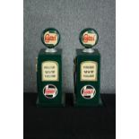 Two wooden storage cupboards in the shape of Castrol petrol pumps. Hand painted in a distressed