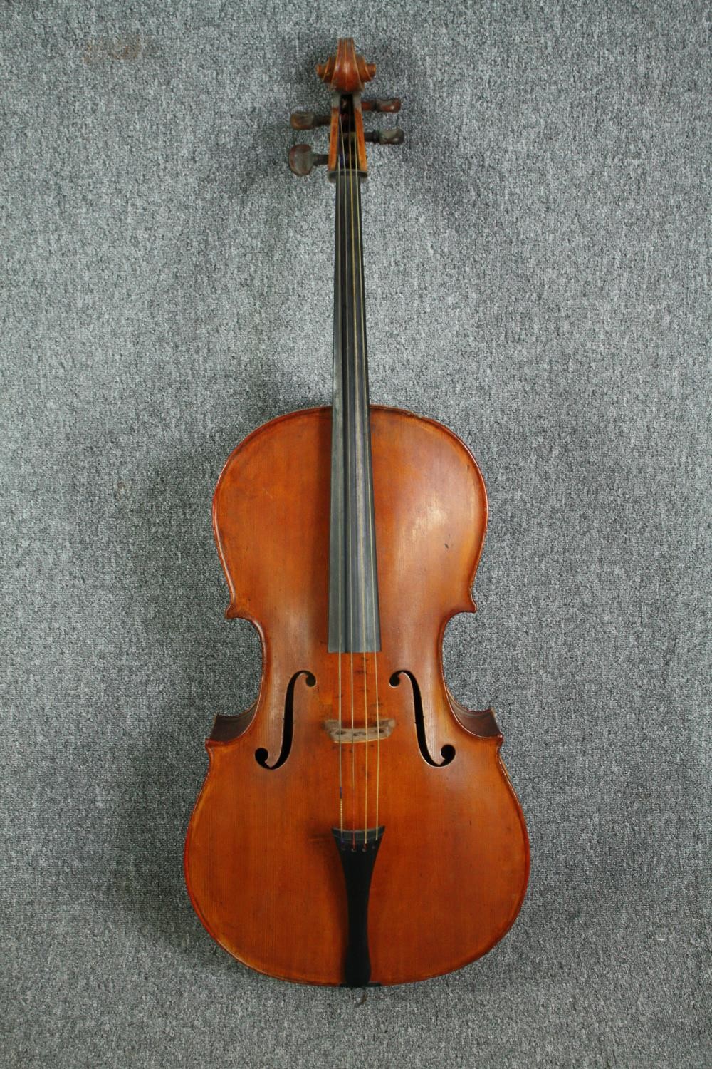 A cello in a soft case with no visible maker's mark. Road worn and with signs of being well - Image 2 of 6