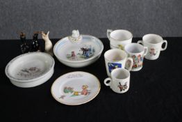 Children ceramic plates and cups. Including Beatrix Potter. Also, three ceramic pie birds. Dia. 9cm.