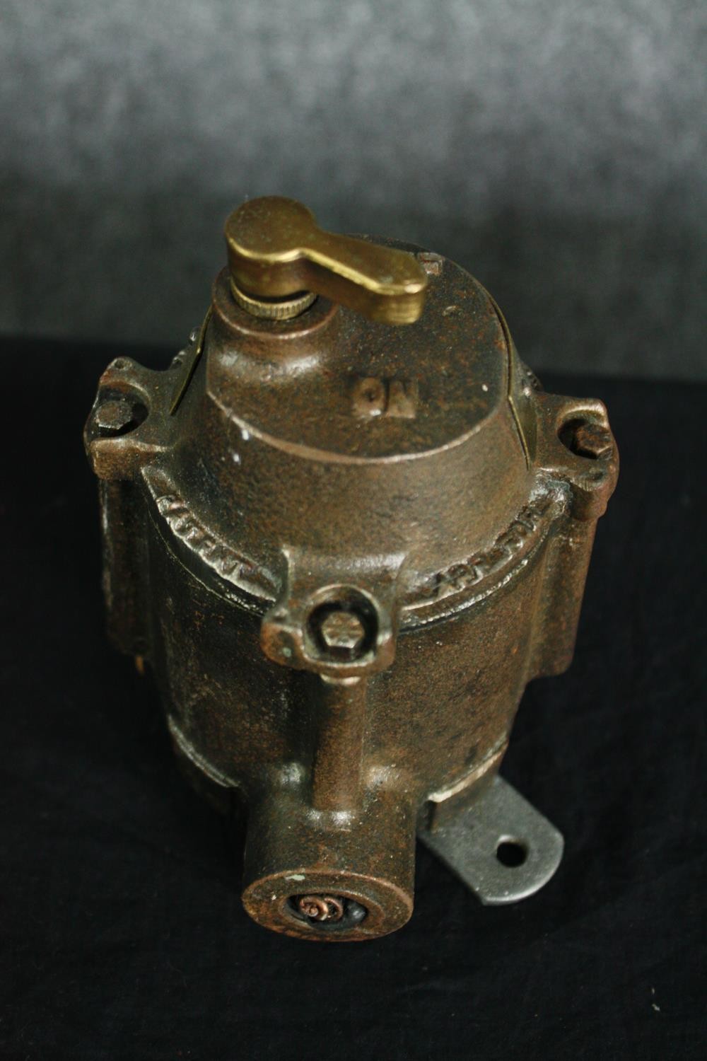 A collection of seven mid century cast iron and brass industrial switches and valves along with - Image 2 of 9