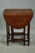 Occasional table, mid century oak with drop flap action. H.73 W.90 D.61cm.