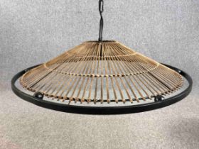 Kindred Lighting. The Mambo natural rattan ceiling pendant. Rattan with a metal surround and