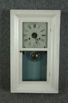 A late 19th century American cased wall clock. H.66 W.39 D.11cm.