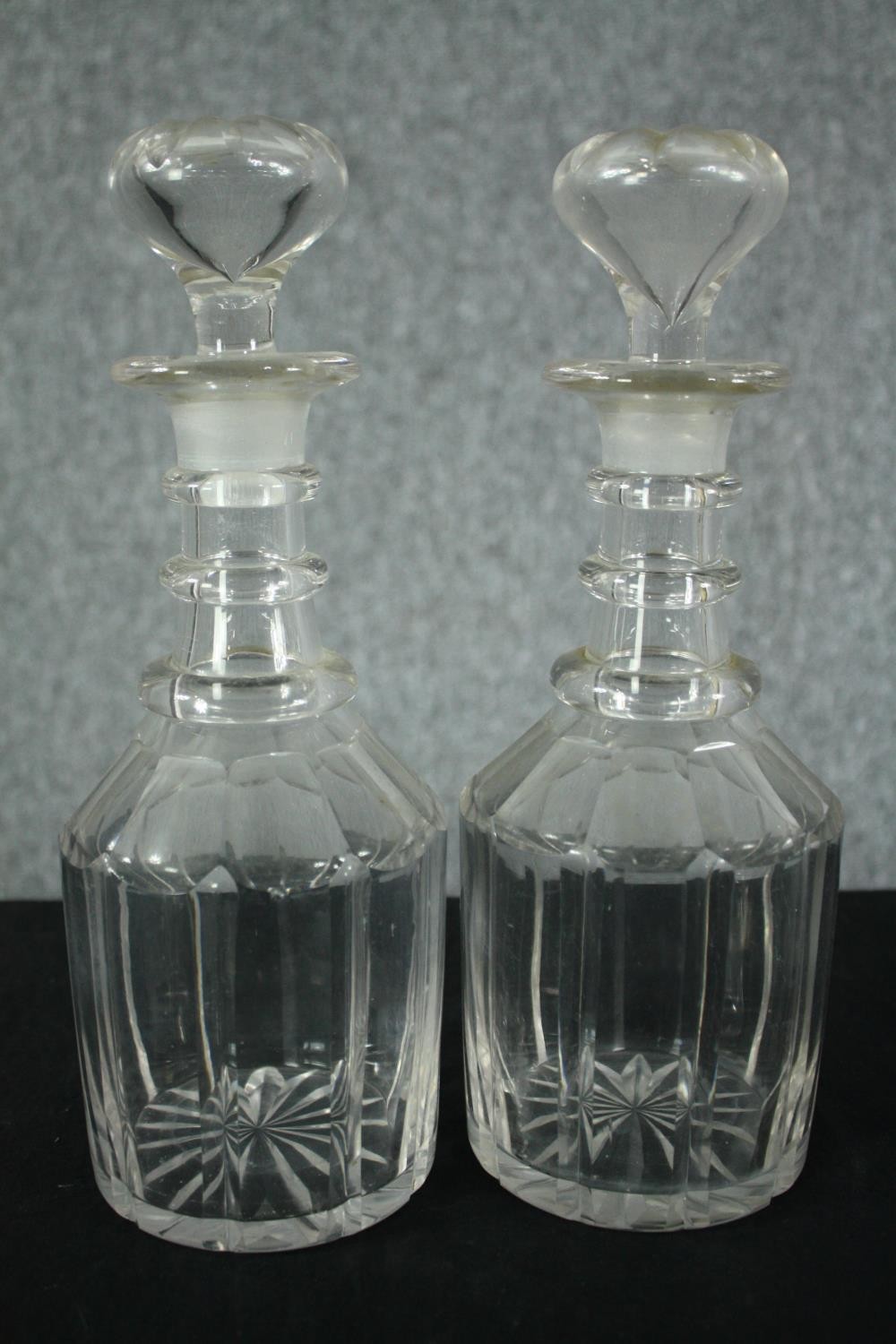 A collection of four early twentieth century cut glass decanters complete with their stoppers. One - Image 2 of 4