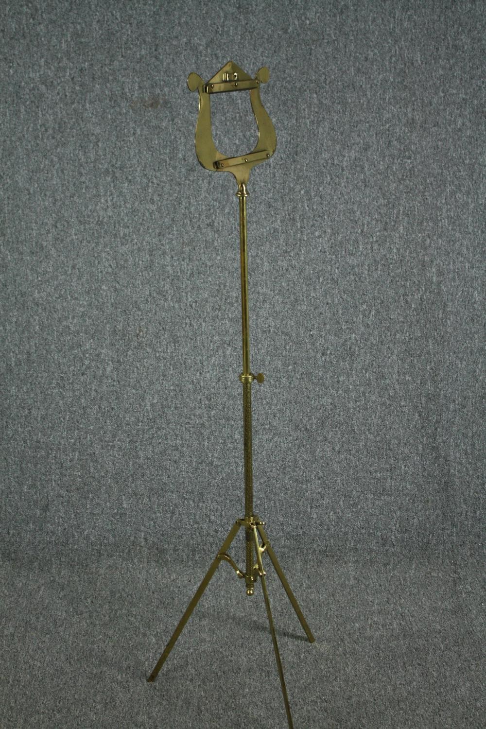 A modern folding brass music stand. H.130cm. - Image 2 of 4