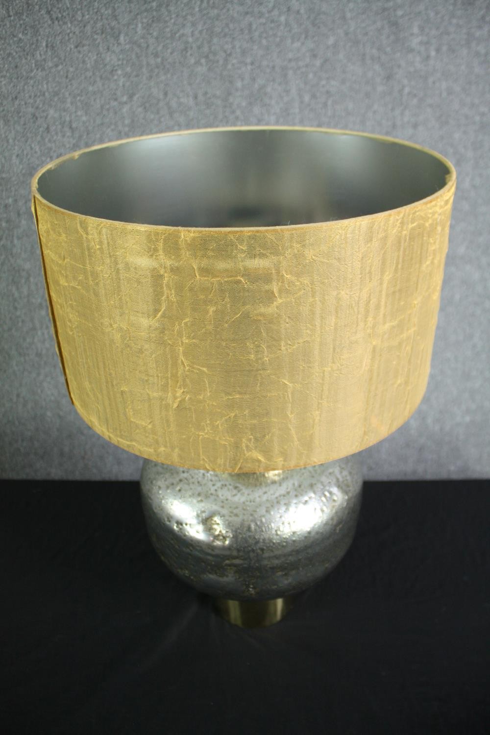 A modern designer table lamp. Brass and steel. With a distressed pitted finished and brass base. The - Image 2 of 5