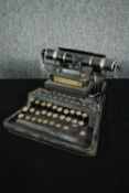 A light modern reproduction of a typewriter. H.17 W.30 D.33cm.