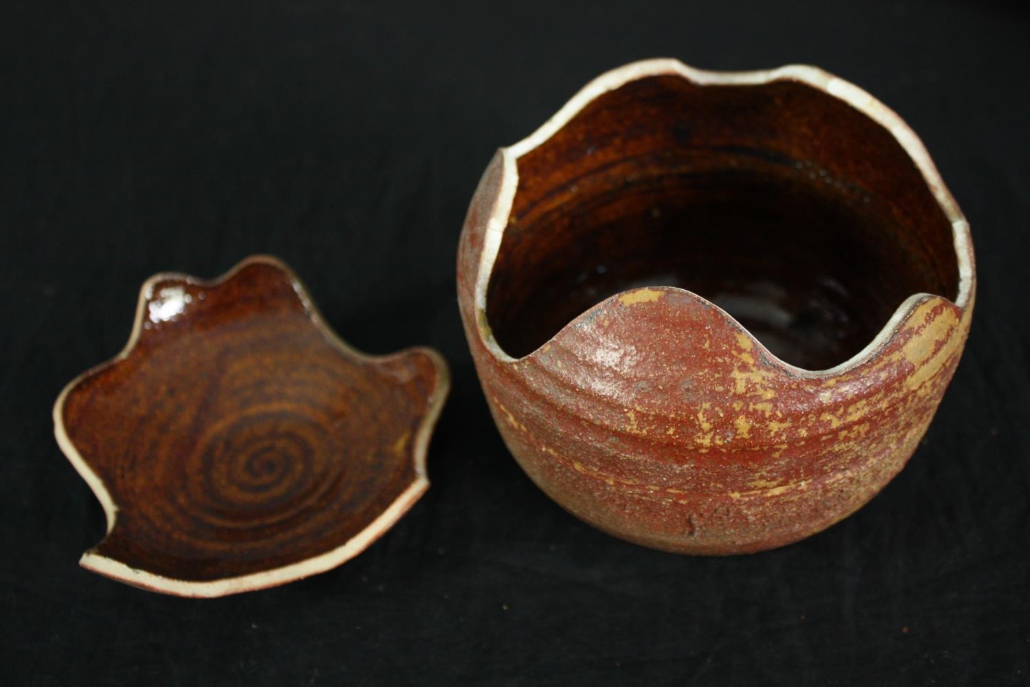 A collection of studio pottery including a round pot with the lid doubling as a bowl. Also, a - Image 7 of 11