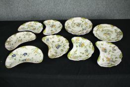 A collection of eleven late 19th century Italian faience (Cantagalli) plates, seven crescent