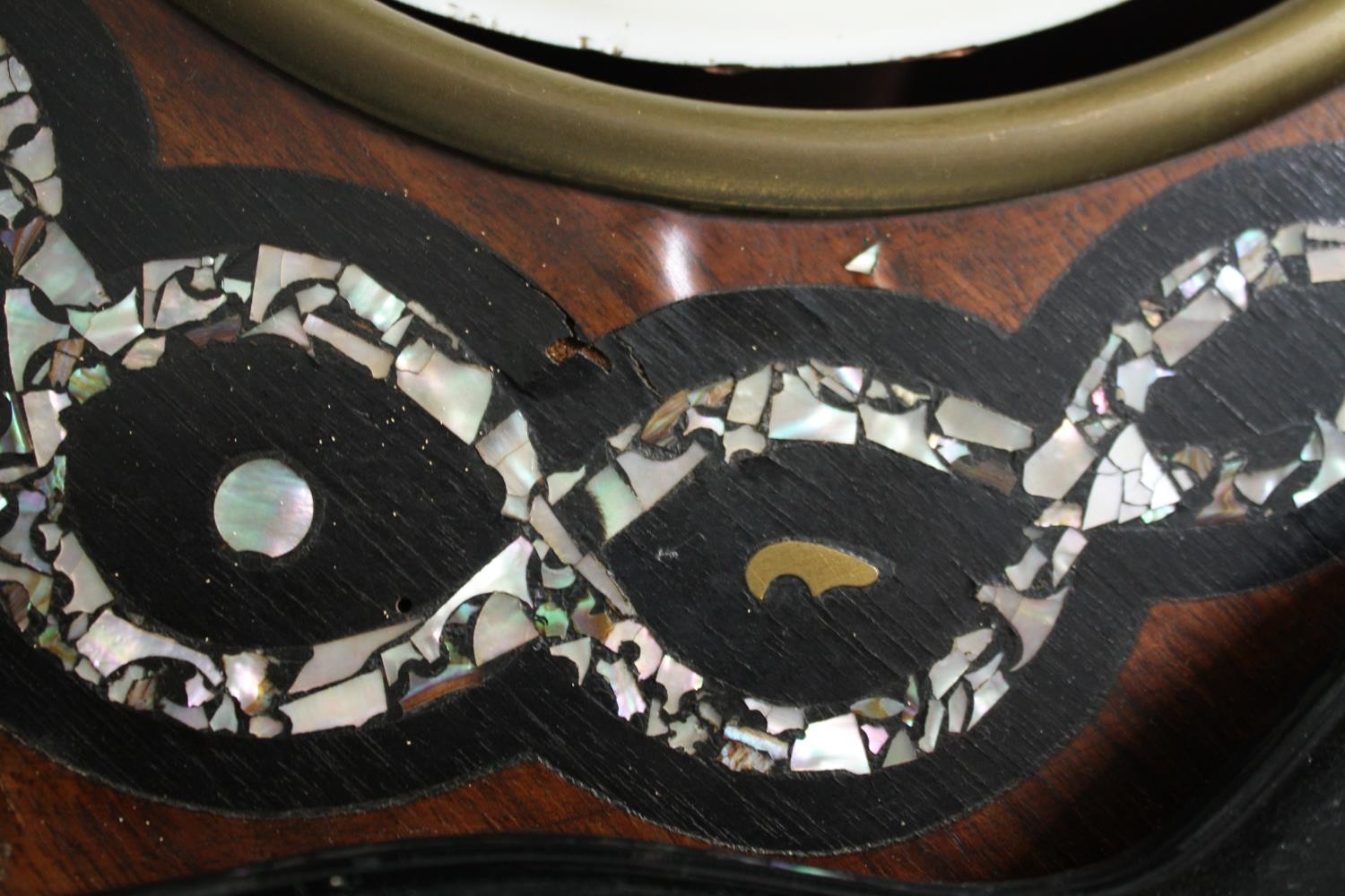 A Napoleon III French ox-eye clock with mother of pearl inlay. Each of white enamel bubbles with a - Image 7 of 7