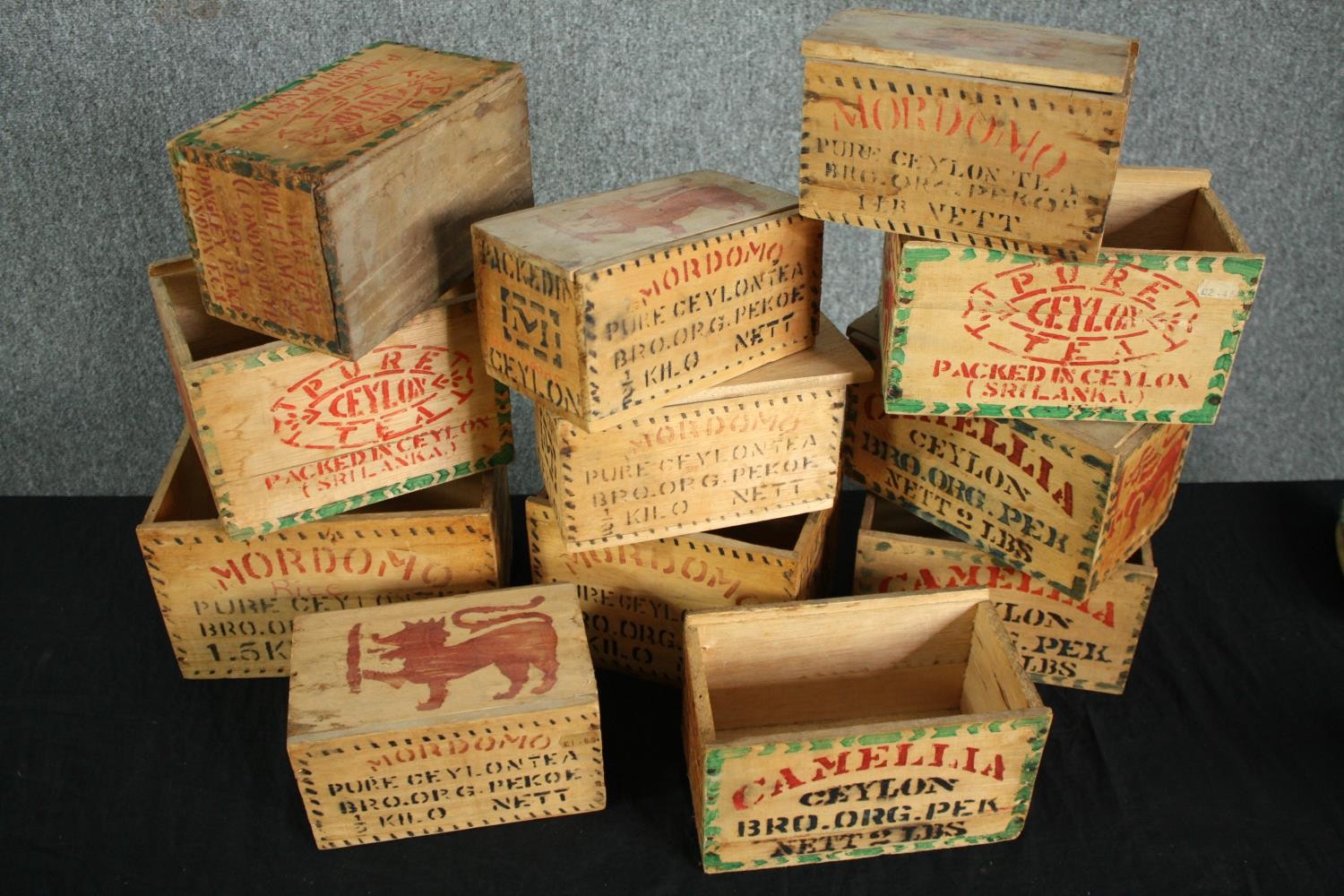 A collection of twelve decorated wooden tea boxes from Ceylon, some by Mordomo. H.15 W.26 D.17cm. - Image 5 of 5