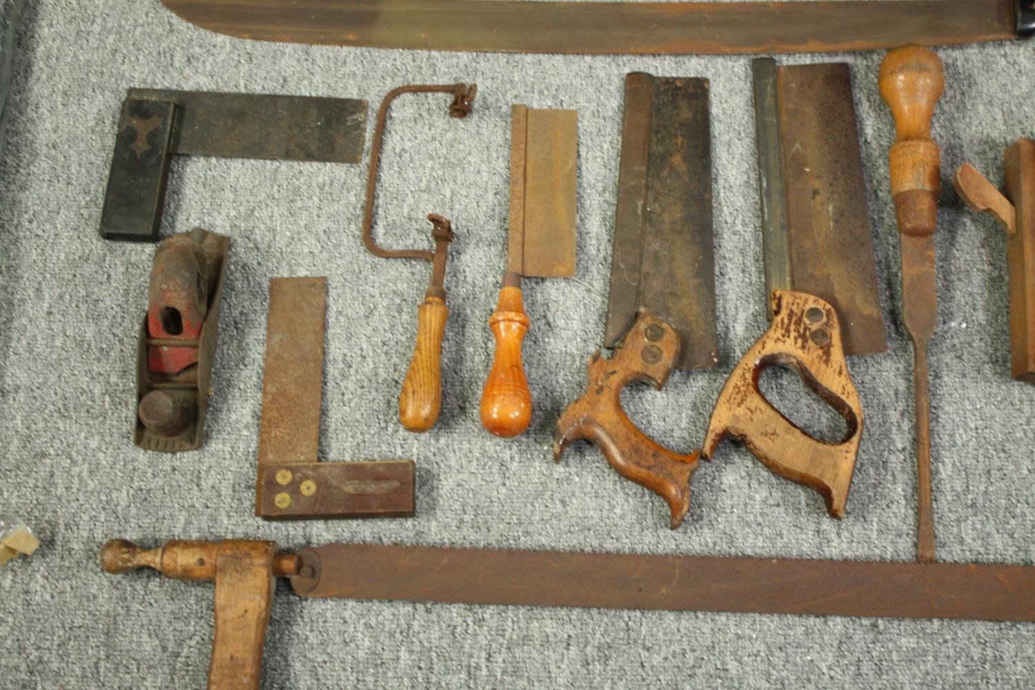 A large mid twentieth century machete and an assortment of wood working tools. The manchette with - Image 4 of 7