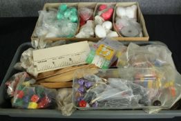 Two boxes of Gallenkamp early 20th century molecular model components, some made of painted